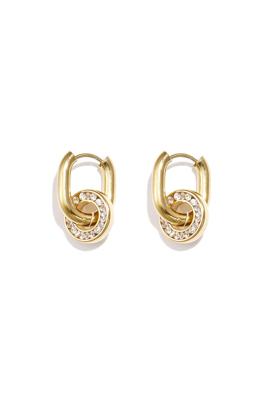 Silver zircon circle drop earrings close-up with polished minimalist silhouette