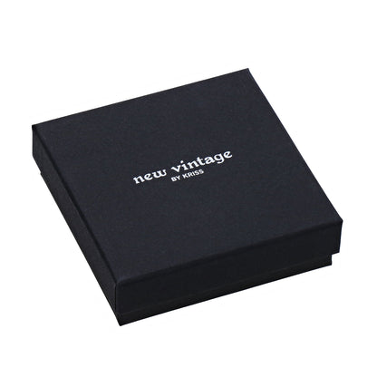 Morning star stud earrings shown with black gift box packaging